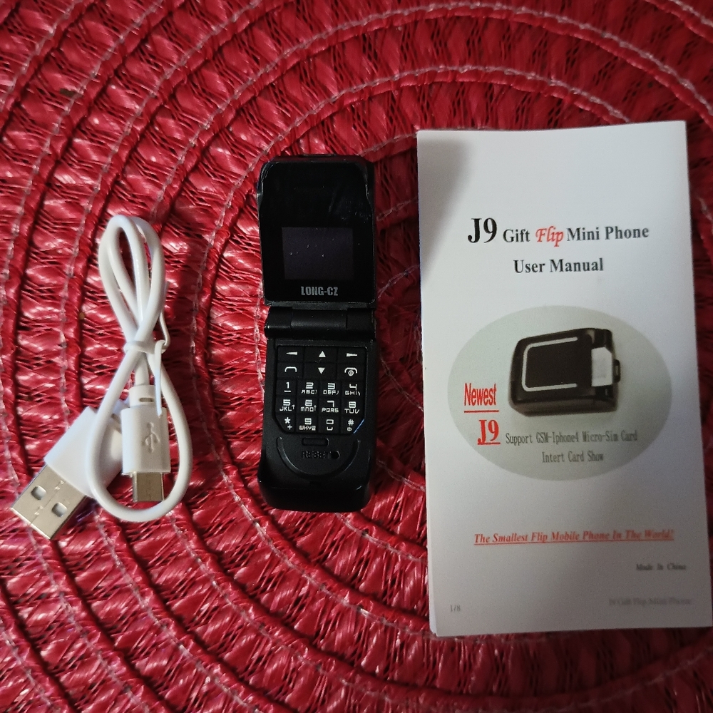 J9 World Smallest Bluetooth Phone with USB Charger